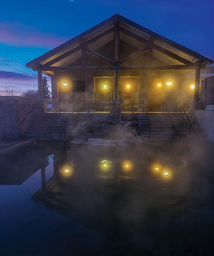 A building with a hot tub outside. AI generated content