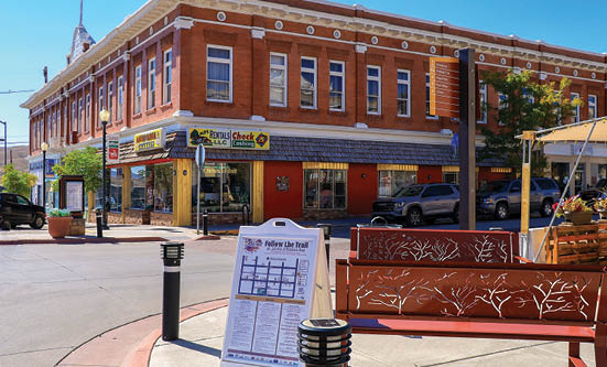 A city street with a bench and a sign. AI generated content